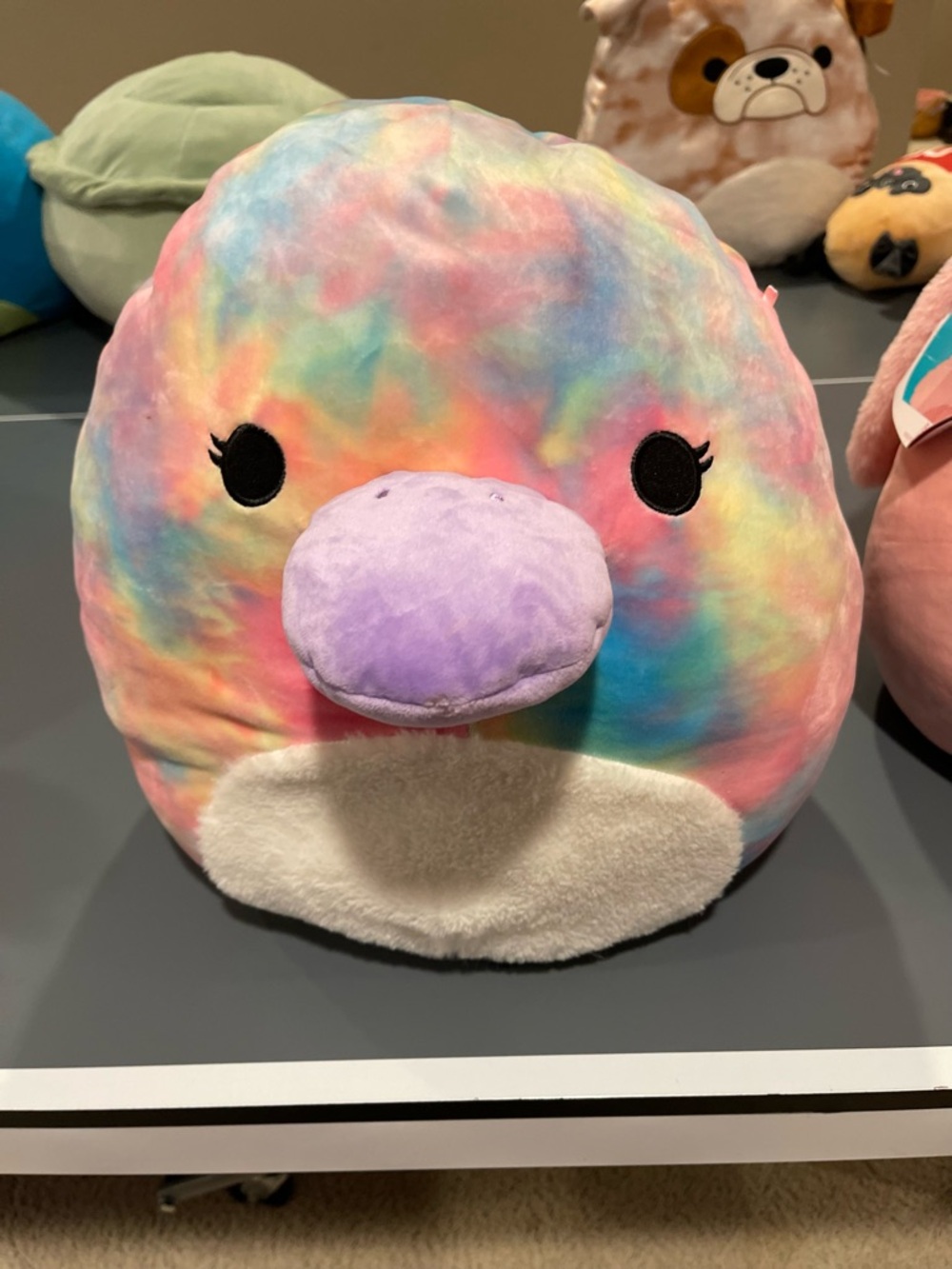Squishmallows Rainbow Tie-Dye Penguin Plush with Lavender Beak